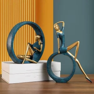 Light green resin girl sculpture set of yoga and reading poses