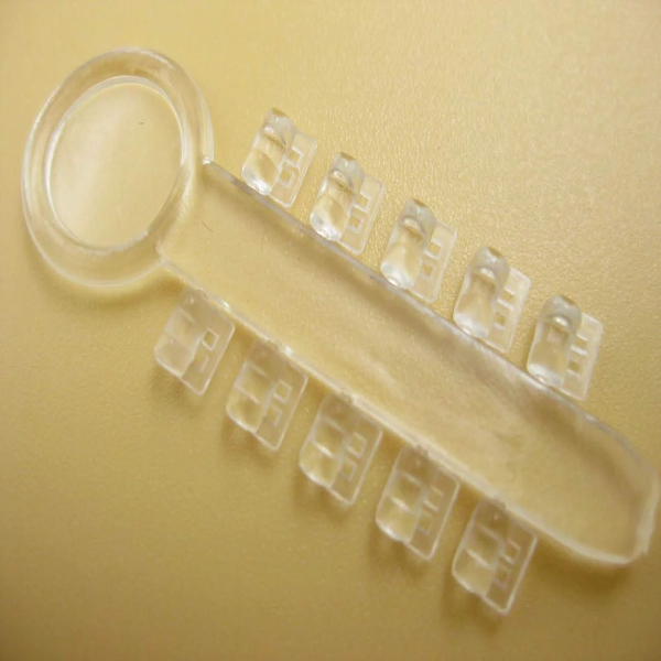 100Pcs Orthodontic Rotation Wedges Ligature Rotary Pad Dental Elastic Rubber Bands (Clear) - Image 3