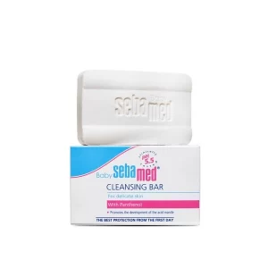 The 150g Sebamed Baby Cleansing Bar resting on a soft towel.