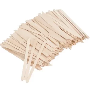 A large bulk pile of Small Wooden Wax Sticks organized neatly alongside their transparent retail packaging.