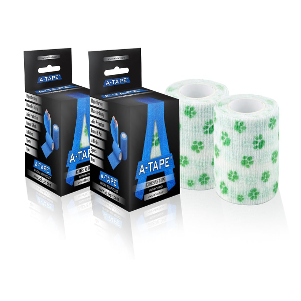 A 2-pack of Agam A-Tape self adhesive cohesive bandage rolls displayed next to a first aid kit for family and pet care in the USA.