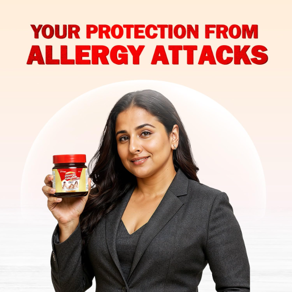Allergy Rakshak Combo on a wooden table with warm milk.
