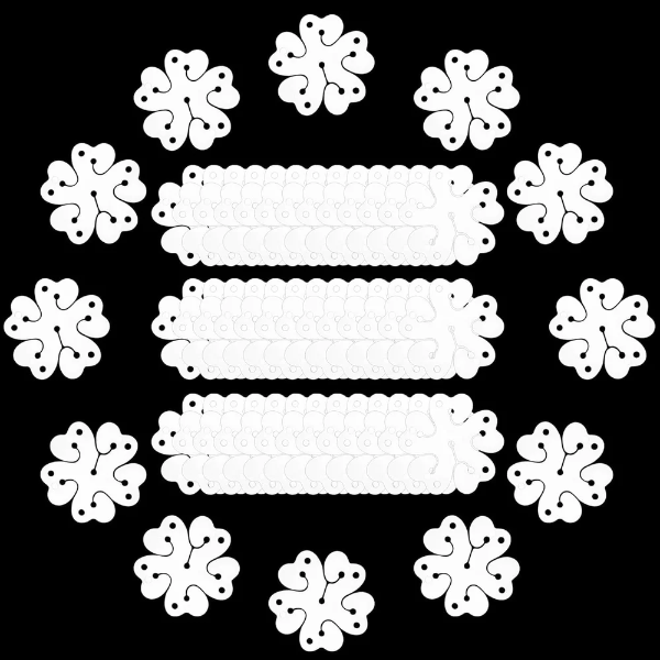 White flower shaped balloon clips used to assemble a colorful party balloon arch.