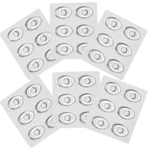 A 6-sheet pack containing 36 transparent foot corn cushions displayed alongside a visual of the pads being worn discreetly on the foot.