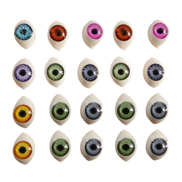 A vibrant collection of one hundred 12x16mm simulated hemisphere fake eyeballs for crafts in a diverse mix of colors spread across a tabletop.