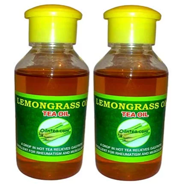Two 200ml amber bottles of pure lemongrass oil displayed together on a modern vanity countertop.