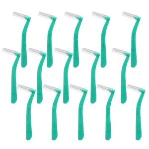 Green L shape interdental brush for orthodontic teeth cleaning.