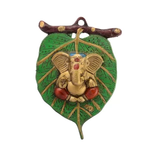Golden Lord Ganesha Wall Hanging Decor – Metal Ganesh Wall Art with Red Dhoti on Green Leaf | Spiritual Hindu Wall Decor for Home, Diwali & Housewarming Gift