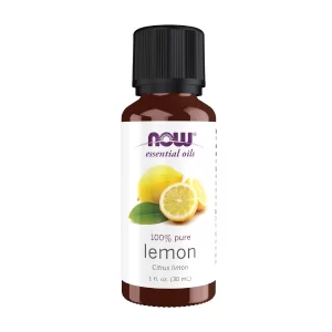 Now Foods Lemon Oil 1 Ounce amber glass bottle featuring a clean white label with a vivid yellow food lemon oil illustration.