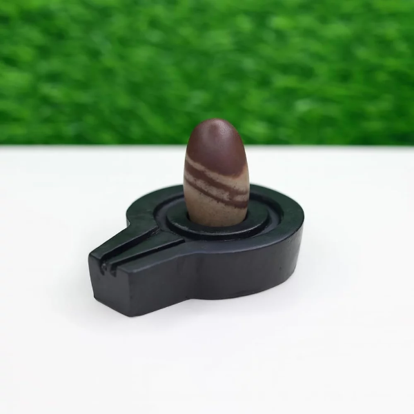 The complete 1.5 inch Original Narmadeshwar Shivling setup for home puja.