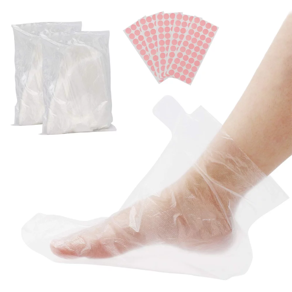 A bulk package of 200 clear plastic paraffin wax foot liners shown with a sheet of round securing stickers.
