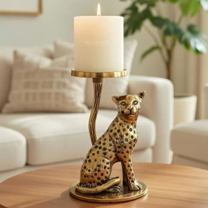 Shining Gold Jaguar Candle Holder styled on a sleek entryway console table.