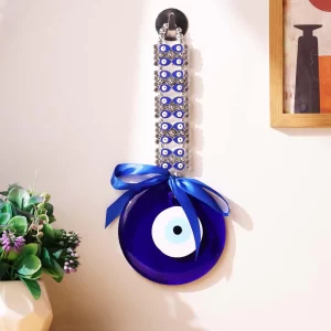 5-inch Shubhanjali polished blue glass Turkish evil eye hanging amulet with a durable hanging thread against a neutral white backdrop