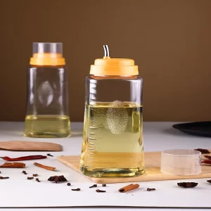 A twin pack of the HomeWiz Leak Proof Plastic Oil Dispenser showing the clear 1-litre bottles.