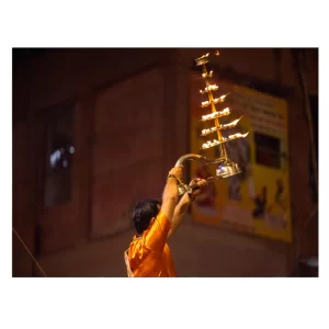 ARTOLIC Ganga Aarti Wall Poster (12x18 Inch) – HD Print of Young Priest Performing Sacred River Ganges Aarti | Spiritual Wall Art for Living Room, Bedroom & Office Décor | Decorative Gift for Home