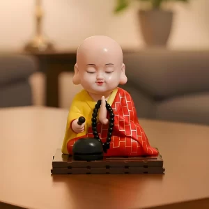 Solar-Powered Moving Buddha Idol for Car Dashboard & Home Décor – Auto On/Off Light, Animated Head & Hand, Red Finish | Perfect for Office Desk & Gifting