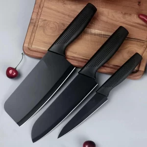 The ZUDELLA 3-Piece Professional Kitchen Knife Set showing three sleek black chef knives arranged neatly.