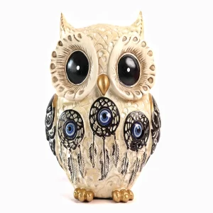 Cream resin Feng Shui owl statue showpiece with multicolor details on white background