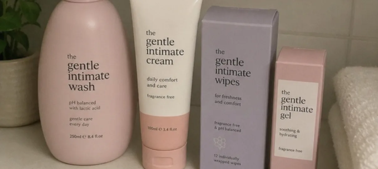 Gentle intimate care products arranged on a bathroom shelf